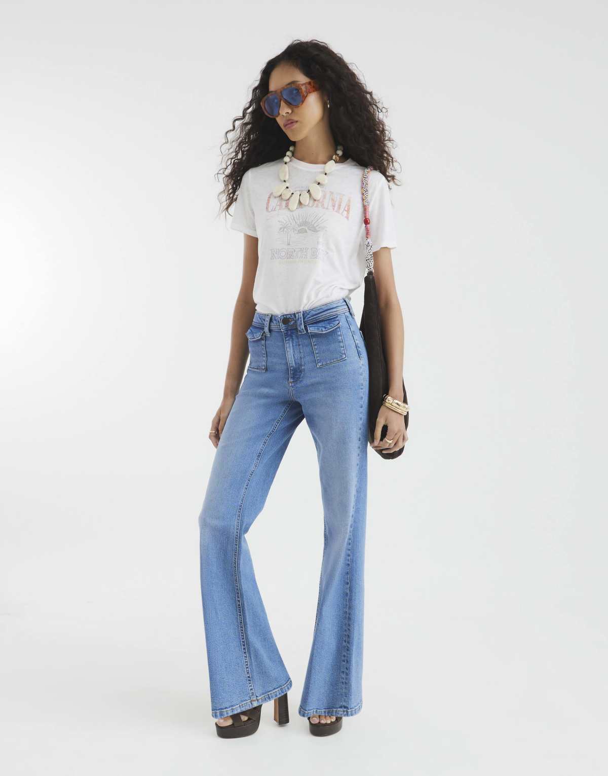 River Island High rise relaxed flare jeans in denim - light