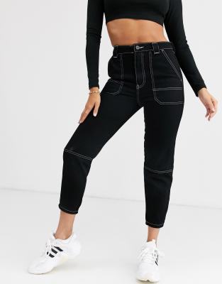 white mom jeans with black stitching