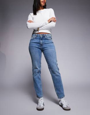 River Island high waist slim jeans in medium denim