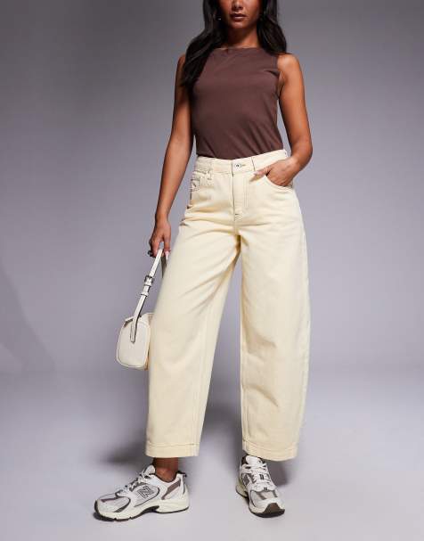 River Island high waisted barrel jeans in butter yellow - view 1