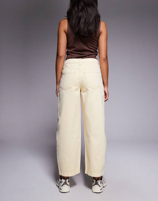 River Island high waisted barrel jeans in butter yellow
