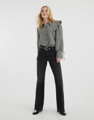River Island High waisted relaxed flared jeans in black
