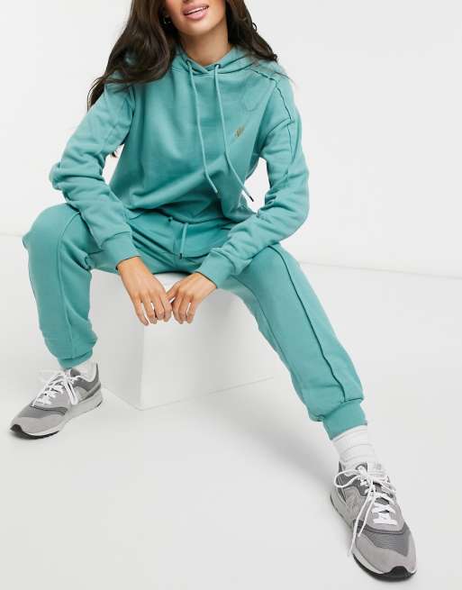 River Island - Hættetrøje med syet logo i mørkegrøn - Del af sæt, 4 af 4
