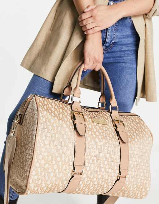 River Island jacquard barrel bag in beige