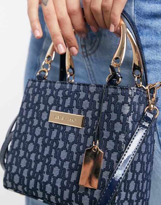 River Island jacquard mini cross body bag in dark blue