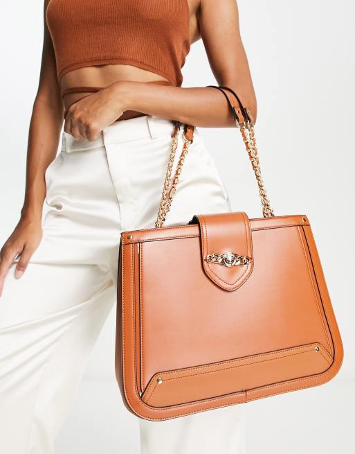 River Island – Jasnobrązowa torba typu tote z łańcuszkiem i głową lwa