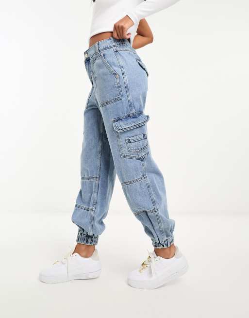 River Island - Jeans cargo blu chiaro con fondo elasticizzato
