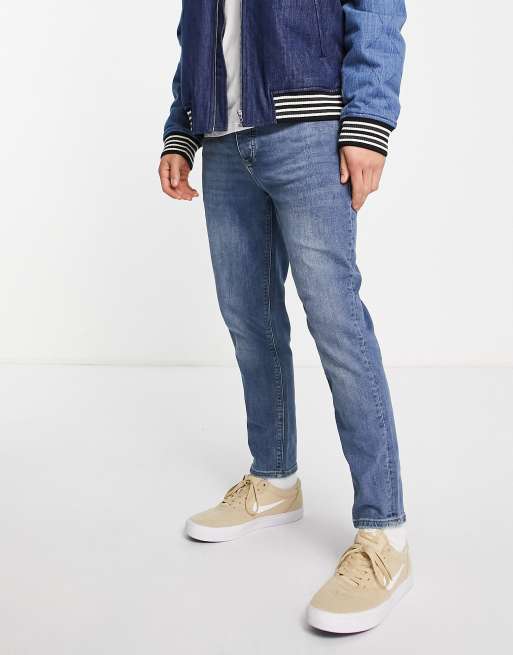 River Island - Jeans met smaltoelopende pijpen in blauw