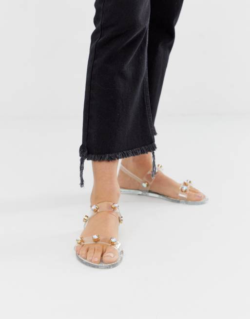 River Island jelly sandals with stud detail in clear ASOS