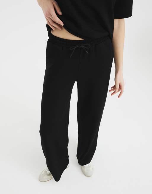 River Island - Joggers minimal a fondo ampio neri, 2 di 3