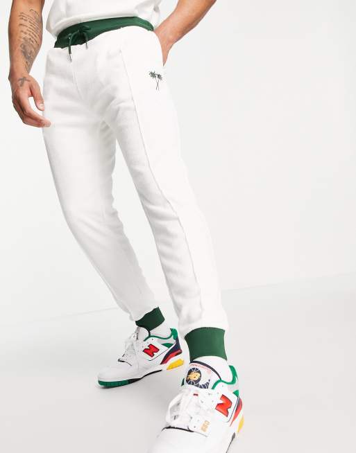 River Island – Jogginghose aus Frottee in Weiß