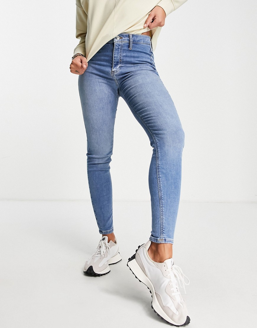 River Island Kaia high rise skinny jeans in mid blue-Gray