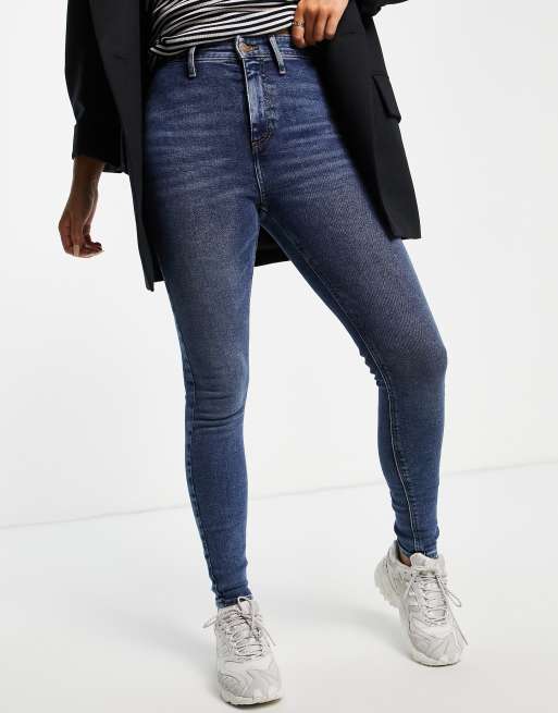 River Island Kaia high rise skinny jeans in mid blue | ASOS