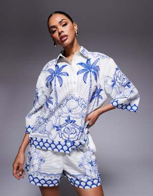 River Island - Kastige Hemdbluse in Blau mit Riviera-Printmuster