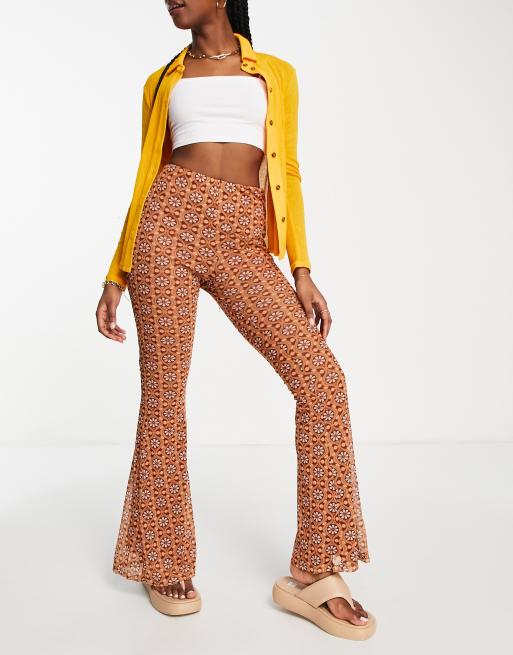 River Island - Kick flare-broek van mesh met bloemenprint in bruin