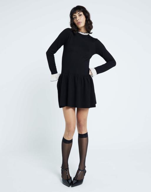 River Island Knit long sleeve frill mini dress in black