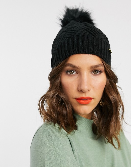 River Island knitted beanie hat with faux fur pom pom in black