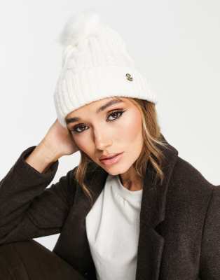 River Island – Kremowa czapka z dzianiny o warkoczowym splocie z pomponem