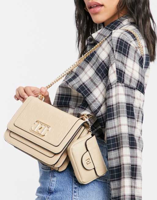 River Island – Kremowa podwójna torebka na pasku z wytłoczonym monogramem