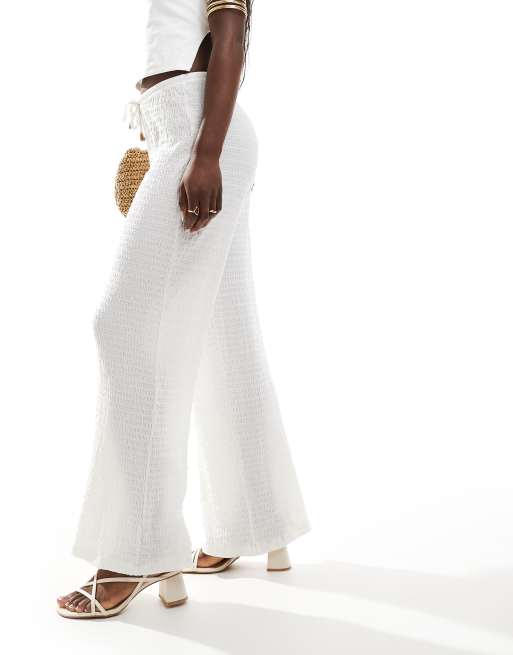 River Island – Kremowe teksturowane spodnie z szerokimi nogawkami