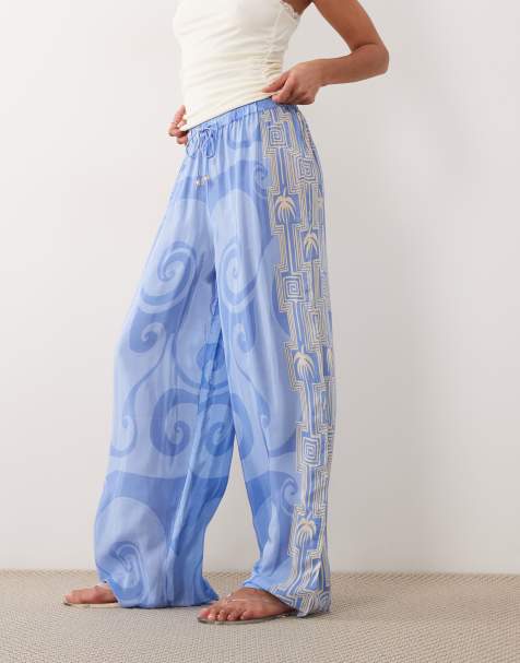 River Island - La Mer - Pantalon de plage à imprimé palmiers - Bleu - view 1