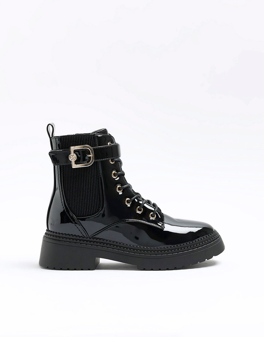 lace up boot with gold buckle in black