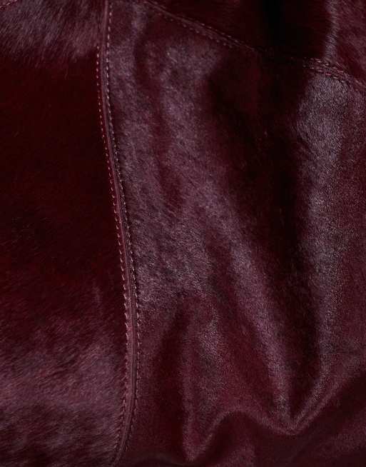 River Island leather 'hair on' slouch bag in burgundy, 2 of 4