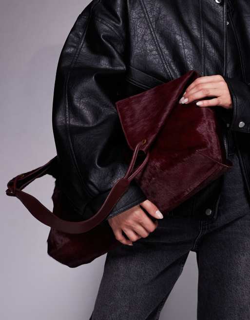 asos red leather backpack Luxury - - Premium Leather ASOS DESIGN backpack tote bag in burgundy is the perfect blend of style and functionality for everyday use Molly Backpack - Cherry red