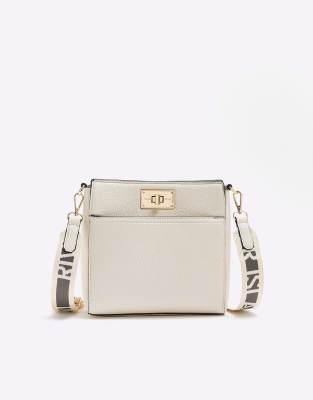 River Island Lock messenger cross body bag in cream - ASOS Price Checker