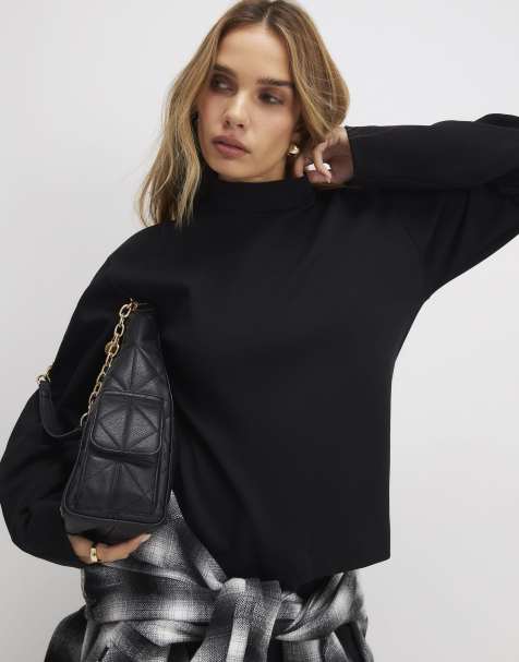 River Island Long sleeve funnel neck top in black - view 1