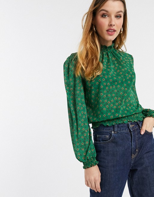 River Island long sleeve high neck shirred top in green print