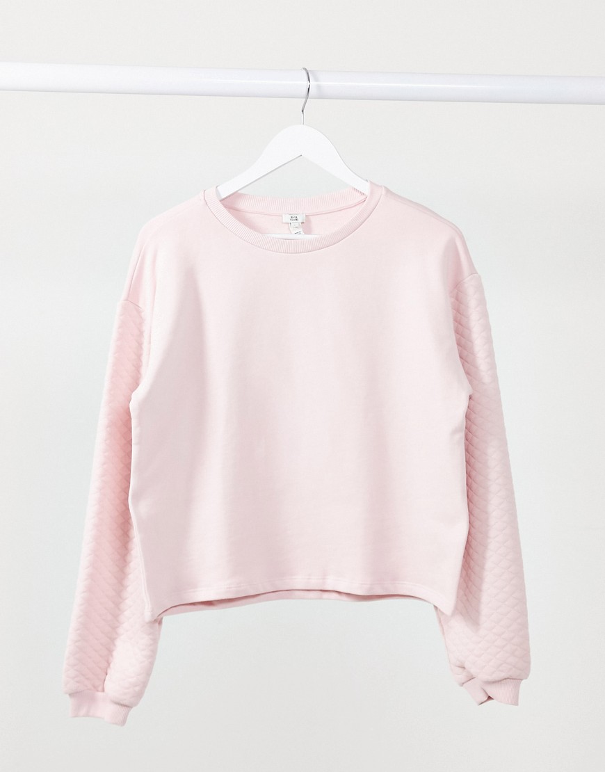 River Island long sleeve quilted sleeve sweatshirt in pink