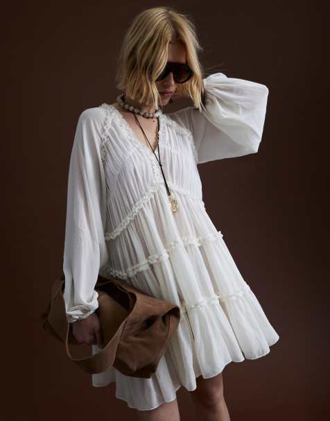 River Island Long sleeve ruffle smock mini dress in cream - view 1