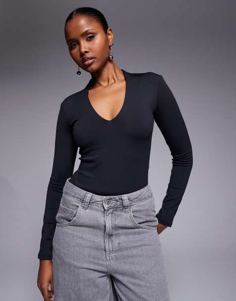 River Island long sleeved plunge polyamide bodysuit in black 