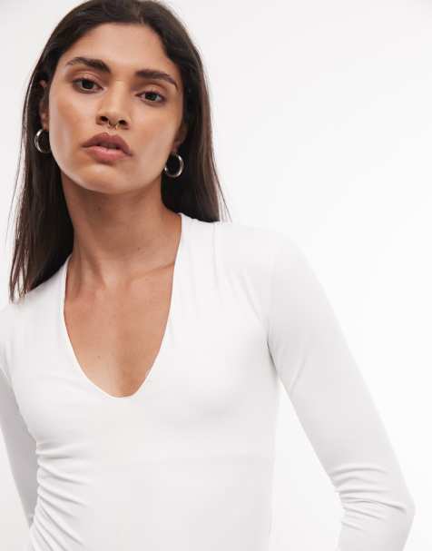 River Island long sleeved plunge polyamide bodysuit in white - view 1