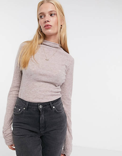 River Island long sleeved roll neck top in light pink | ASOS