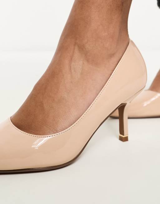 Beige low shop heel shoes