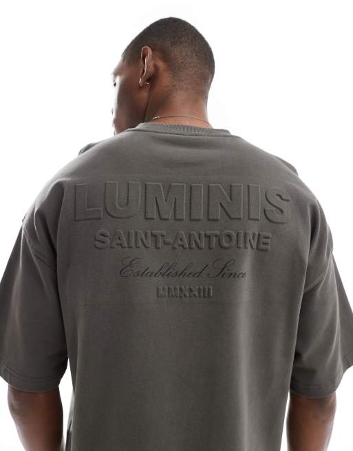 River Island - Luminis - T-shirt oversize color kaki con dettaglio in rilievo