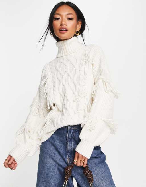 River Island - Maglione lavorato a trecce color crema con frange