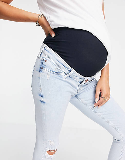 Women River Island Maternity Molly overbump ripped knee bleached skinny jeans in light auth blue 