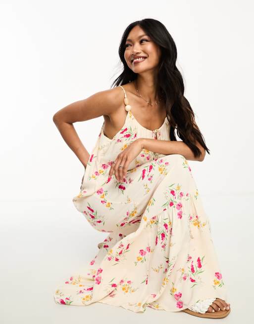 River Island - Maxi slipdress met bloemenprint in zachtgeel