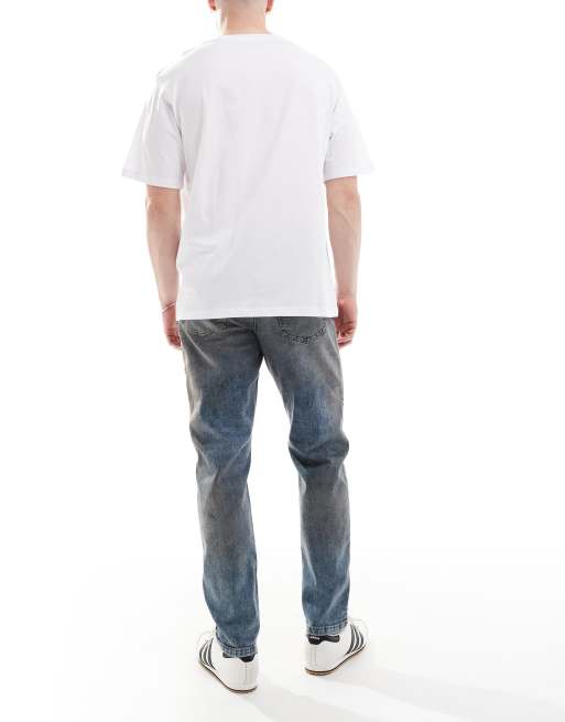 River Island - Mellemvasket blå jeans i tapered pasform, 3 af 5