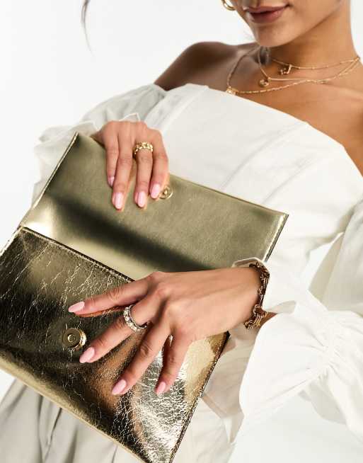 River island store gold clutch