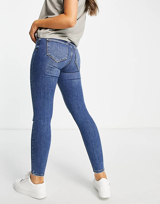 River Island mid rise ripped skinny jeans in dark blue 