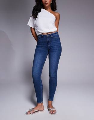 mid rise sculpt skinny jeans in dark wash blue