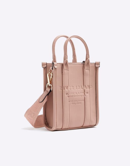 River Island Mini debossed cross body bag in pink medium