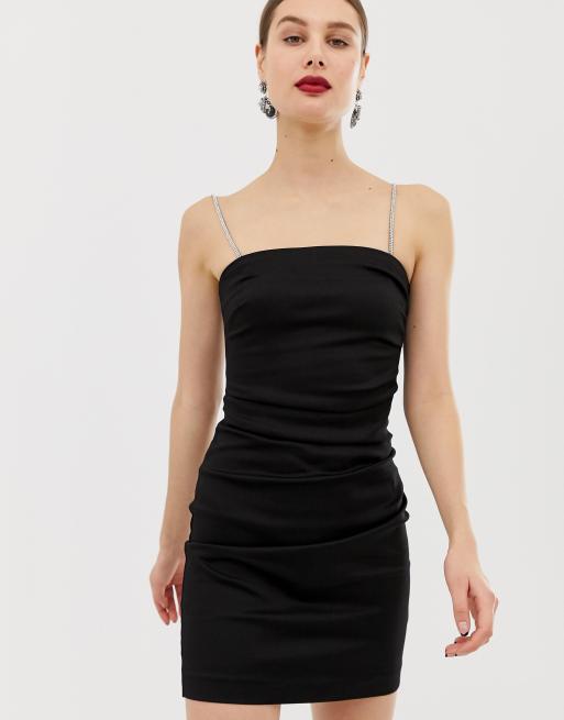 Black dress shop with diamond straps