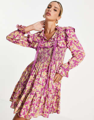 River Island - Mini-jurk met lange mouwen en gesmokte schouderpas in roze bloemenprint