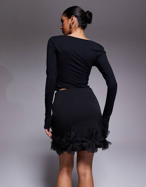River Island – Minirock in Schwarz mit 3D-Blumendetail, 4 von 5