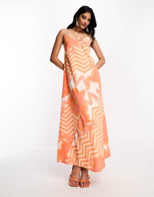 River Island mixed print slip dress in orange 